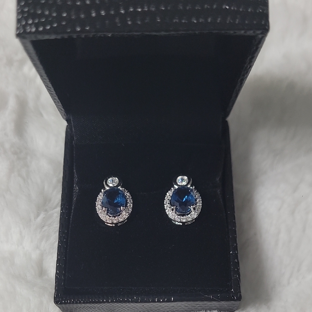 Gold Coast Sterling Silver Topaz and Silver Teardrop Earrings with Gemstone Halo